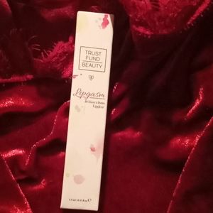 Trust fund beauty Lipgasm Lip Gloss in unprofessio